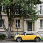 mini cooper next to a flat in the UK